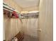 Functional closet space with shelving, racks, and space for storage at 175 Hibiscus Way, Leesburg, FL 34748