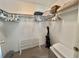 Walk-in closet with shelving and space for storage at 175 Hibiscus Way, Leesburg, FL 34748