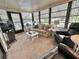 Cozy living room filled with natural light and comfortable furniture at 175 Hibiscus Way, Leesburg, FL 34748