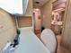 A modern office area with bright desk space and a comfortable chair at 175 Hibiscus Way, Leesburg, FL 34748