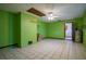 Spacious basement with painted brick, drop ceiling, tile floors, and ready for customization at 18015 Palm St, Umatilla, FL 32784