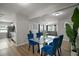 Bright open-concept kitchen, dining and living room layout with modern design at 1805 Jefferson Dr, Mount Dora, FL 32757