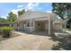 Charming single-story home featuring a covered carport and well-maintained landscaping at 1805 Jefferson Dr, Mount Dora, FL 32757