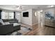 Spacious living room showcasing luxury vinyl floors and elegant furniture arrangement at 1805 Jefferson Dr, Mount Dora, FL 32757