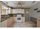 Modern kitchen with stainless steel appliances, stylish cabinetry, and durable countertops at 2003 Cordero Ct, The Villages, FL 32159