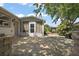 Spacious paver patio with a screened-in porch, ideal for outdoor entertaining at 2003 Cordero Ct, The Villages, FL 32159