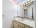 Bathroom featuring a large mirror above the vanity sink at 2024 Meadowside Dr, Eustis, FL 32726