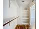 Spacious walk-in closet with custom shelving at 2024 Meadowside Dr, Eustis, FL 32726