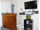 Well-decorated bedroom features an aquarium, TV, and themed decor at 23515 Poinsettia Ave, Fruitland Park, FL 34731