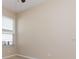 Bright bedroom with natural light from the window with blinds at 245 Blue Cypress Dr, Groveland, FL 34736