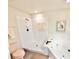 Functional bathroom with a walk-in shower, soaking tub, and neutral finishes, offering convenience and style at 26612 Bella Vista Dr, Howey In The Hills, FL 34737