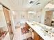 Spacious bathroom with double sinks, a soaking tub, a separate shower, and ample storage, designed for comfort at 26612 Bella Vista Dr, Howey In The Hills, FL 34737