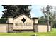 Elegant community sign for Bishops Gate, highlighting the golf and lakeside living, marking a prestigious neighborhood at 26612 Bella Vista Dr, Howey In The Hills, FL 34737