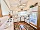 Well-equipped kitchen with modern appliances, ample counter space, and a bright and airy atmosphere at 26612 Bella Vista Dr, Howey In The Hills, FL 34737