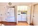 Convenient laundry area with a washer, dryer, and additional storage space at 26612 Bella Vista Dr, Howey In The Hills, FL 34737