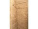 Tiled shower with natural stone-look tiles for a serene and spa-like experience at 2701 S Dellwood Dr, Eustis, FL 32726