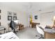 Office with a ceiling fan, carpet, multiple desks, and a view into another room at 2712 Plainridge Loop, The Villages, FL 32162