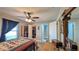 Bedroom with carpet, ceiling fan, and closet door open showing the closet at 2718 Lorraine Dr, Leesburg, FL 34748
