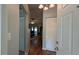Inviting entryway with hardwood floors and a view into the living area at 2718 Lorraine Dr, Leesburg, FL 34748