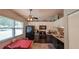 The kitchen features modern appliances, two-tone cabinets, and natural light creating an inviting atmosphere at 2718 Lorraine Dr, Leesburg, FL 34748