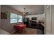 Cozy eat-in kitchen featuring white cabinets, stainless appliances and tile floors at 2718 Lorraine Dr, Leesburg, FL 34748
