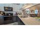 Updated kitchen featuring stainless steel appliances, modern countertops, and a convenient layout for cooking at 2718 Lorraine Dr, Leesburg, FL 34748