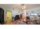 Spacious living room with vaulted ceilings, comfortable seating, and a convenient layout for entertaining guests at 2718 Lorraine Dr, Leesburg, FL 34748