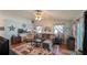 Inviting living room showcasing a comfortable sofa, stylish decor, and ample natural light, perfect for Gathering gatherings at 2718 Lorraine Dr, Leesburg, FL 34748