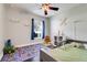bedroom with lots of natural light features hardwood floors and ceiling fan at 2889 Columbus Ave, Clermont, FL 34715