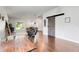 Inviting living space with hardwood floors, a sliding barn door, and comfortable seating perfect for relaxation at 2889 Columbus Ave, Clermont, FL 34715
