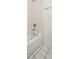 Bathroom with a classic white tub and shower, offering a clean design at 2896 Picadilly Cir, Kissimmee, FL 34747