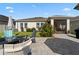 Paver patio features comfortable seating around a fire pit, perfect for entertaining and enjoying the outdoors at 2928 Marlberry Ln, Clermont, FL 34714