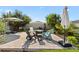 Paver patio features comfortable seating around a fire pit, perfect for entertaining and enjoying the outdoors at 2928 Marlberry Ln, Clermont, FL 34714