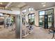 A modern gym featuring state-of-the-art exercise equipment and plenty of natural light at 2928 Marlberry Ln, Clermont, FL 34714