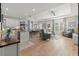 Expansive living space with hardwood floors, open concept layout, and modern decor for comfortable living at 2928 Marlberry Ln, Clermont, FL 34714