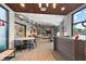 Stylish lobby area with modern seating, large windows, and contemporary decor at 2928 Marlberry Ln, Clermont, FL 34714