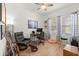 Well-lit office space with a desk, comfortable chair, and modern decor at 2928 Marlberry Ln, Clermont, FL 34714