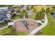Aerial view of the community playground with slides, swings, and shaded seating areas at 2928 Marlberry Ln, Clermont, FL 34714