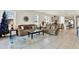 Open-concept living space with large windows and plenty of natural light, offering a warm and inviting atmosphere at 31760 Broadwater Ave, Leesburg, FL 34748
