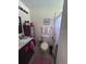 Bathroom featuring a toilet, vanity, mirror, and shower with curtain at 3306 Sandy Shore Ln, Kissimmee, FL 34743