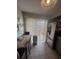 Bright breakfast nook with large windows and modern appliances at 3306 Sandy Shore Ln, Kissimmee, FL 34743