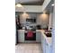 Modern kitchen featuring stainless steel appliances and ample counter space at 3306 Sandy Shore Ln, Kissimmee, FL 34743