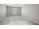 Bright bedroom with neutral walls, carpet, and a ceiling fan at 33417 Pennbrooke Pkwy, Leesburg, FL 34748