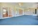 Spacious lanai with ceiling fans and sliding glass door access at 33417 Pennbrooke Pkwy, Leesburg, FL 34748