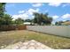 A spacious backyard with a privacy fence, lawn and space for outdoor entertaining at 3677 Park Green Ct, Tavares, FL 32778