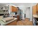 Functional kitchen area with stainless steel appliances and ample counter space at 3677 Park Green Ct, Tavares, FL 32778