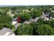 The home resides in a neighborhood with lush landscaping and a nearby golf course at 3718 Westerham Dr, Clermont, FL 34711