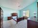 Spacious bedroom featuring neutral carpet and light-aqua painted walls at 3718 Westerham Dr, Clermont, FL 34711