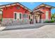 Arlington Ridge's Blue Ridge Activity Center features stonework, covered porch, and manicured landscaping at 4716 Heritage Trl, Leesburg, FL 34748