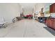 Massive garage with storage and parking for boat, bikes, tools and vehicles at 4716 Heritage Trl, Leesburg, FL 34748